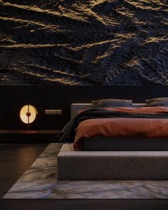 A modern bedroom at night featuring an elegant bed with plush burnt orange and gray bedding, a unique circular bedside lamp casting a warm glow, set against a luxurious dark textured wall and a sleek marble floor.